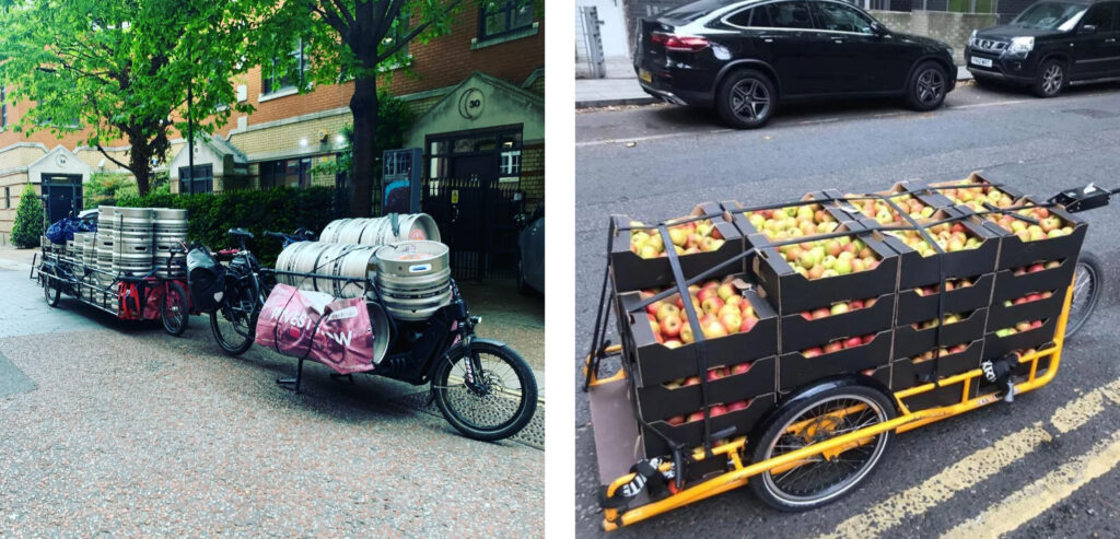 The image shows two images of Pedal Me cargo bikes and trailers. The image to the left shows a fully loaded cargo bike and trailer with beer kegs stacked neatly on one another. The cargo bike is on a road in the foreground, a red brick building and trees are in the background. The image to the right shows a small trailer loaded with boxes of apples. The trailer is in the foreground and two cars are in the background. 