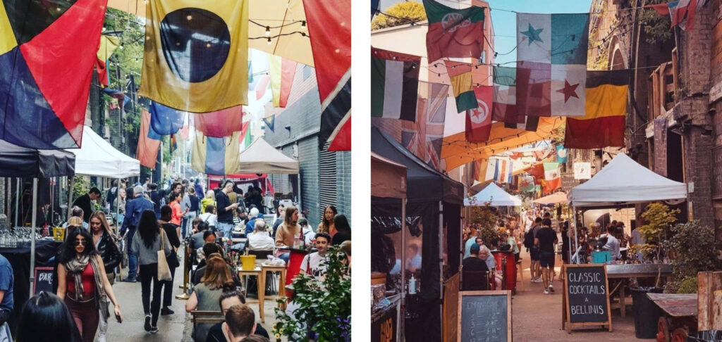 The image shows two scenes of Maltby Street Market. The image on the left shows a busy street with customers, traders and their stalls stretching into the distance. Overhead, flags are suspended from wires which are attached to a railway viaduct to the left and a building to the right. The image to the right shows a similar scene but looking from the opposite direction, with the railway viaduct to the right of the image. In the foreground are trader gazebos and A-boards, one is advertising cocktails. 