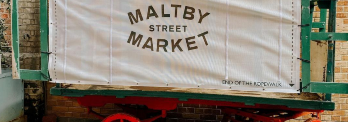 Maltby Street Market entrance welcome sign.
